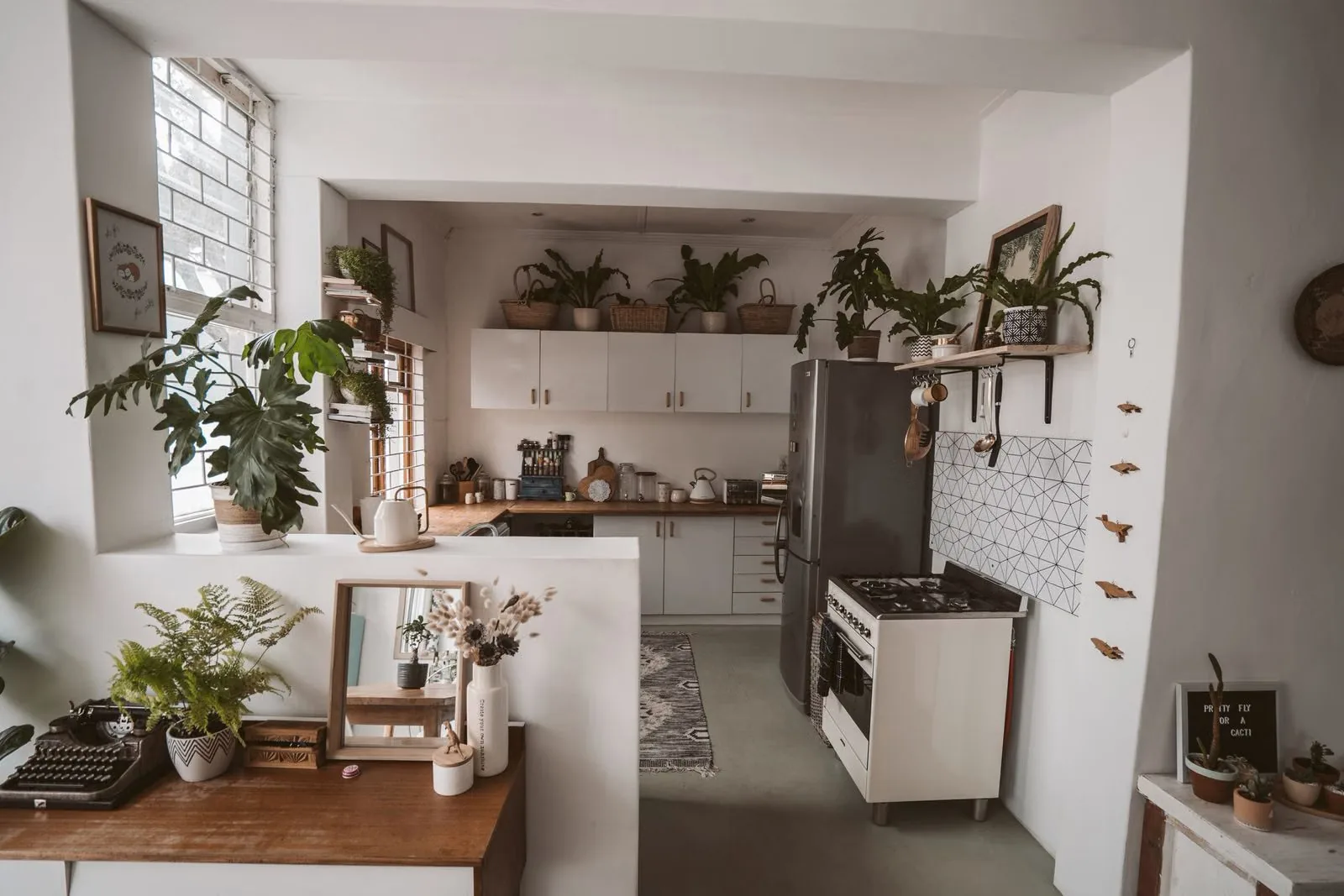 Photo of a cozy narrow galley kitchen in a rental apartment