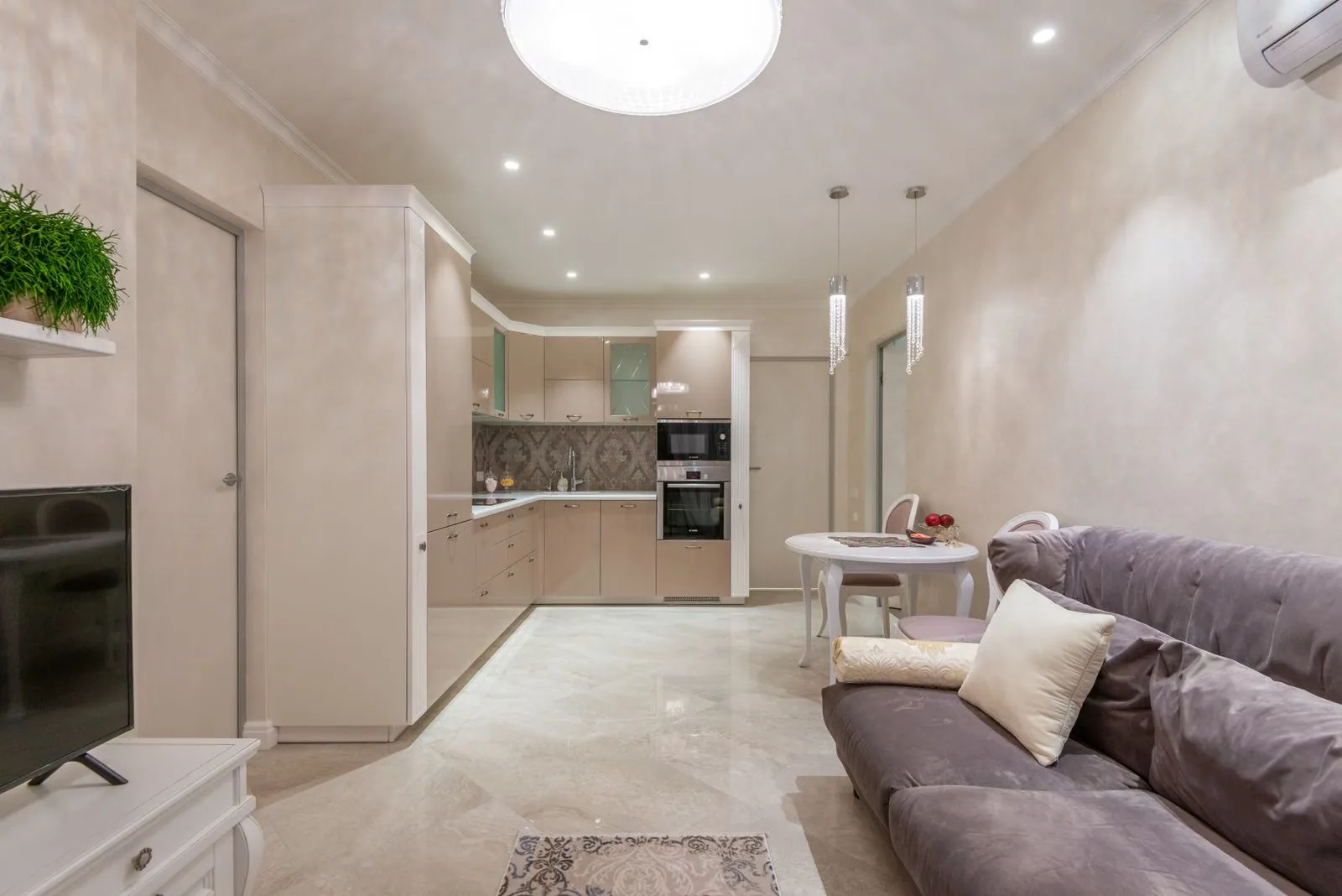 Photo of a bright decluttered small rental kitchen